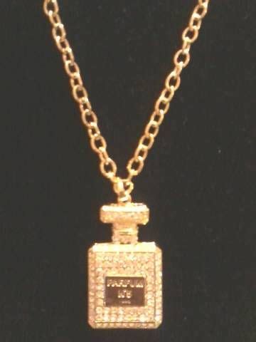 chanel bottle on chain|Chanel no 5 bottle necklace.